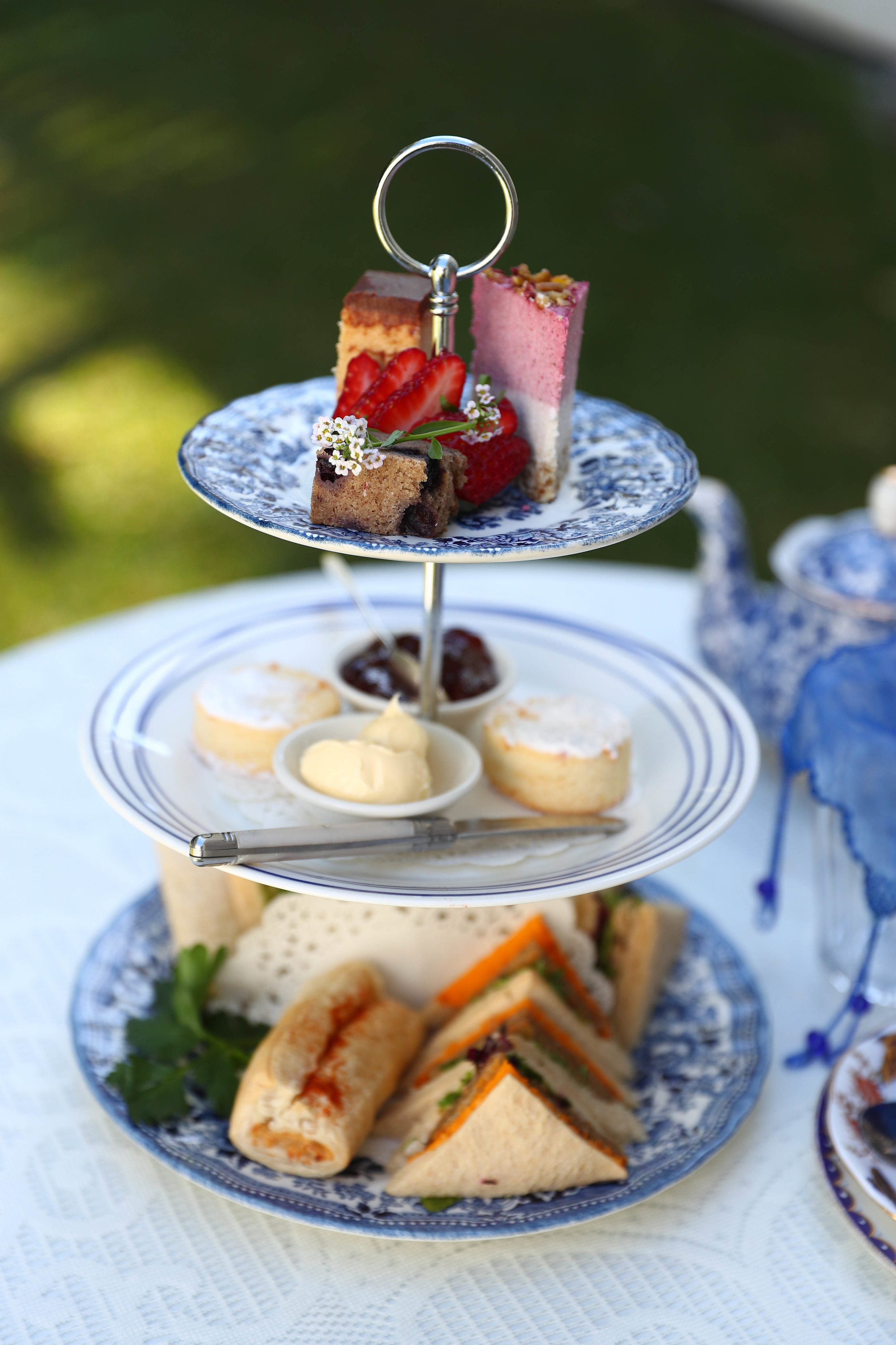 Vegan high tea is served on a beautiful, vintage tiered tray