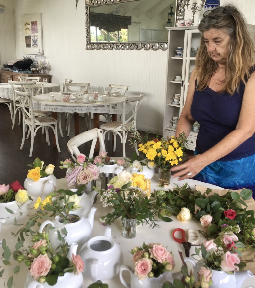 Ali arranges sweet posies for each table in the tea rooms.